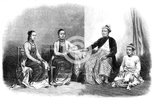 Burmese ladies and gentleman, with an attendant, 1870. Creator: Unknown.