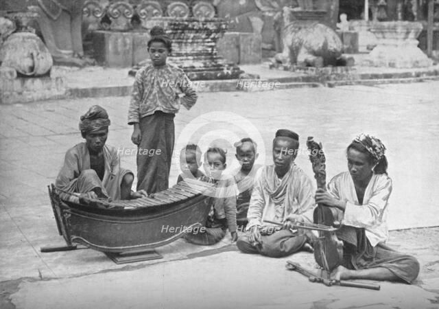 Burmese musicians, 1902. Artist: P Klier.