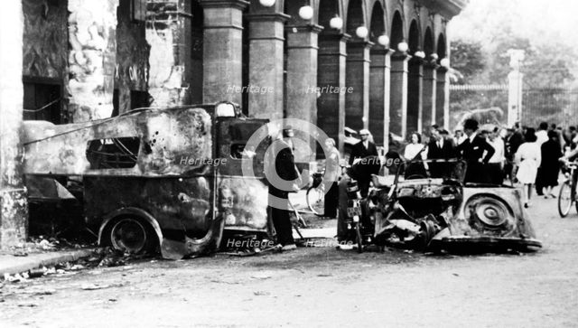Burned out vehicles in the Rue de Castiglione, liberation of Paris, 25 August 1944. Artist: Unknown