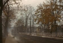 Burning the autumn leaves in Norwich, Connecticut, 1940. Creator: Jack Delano