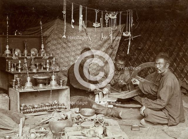 Buryat mechanics making "burkhanov" - Buryat goods, 1895-1939. Creator: L Veniukov.