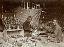 Buryat mechanics making "burkhanov" - Buryat goods, 1895-1939. Creator: L Veniukov