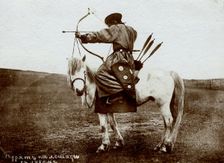 Buryat on horseback with bow, 1895-1939. Creator: L Veniukov