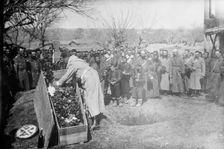 Burying soldier who cut barbed wire defence of Adrianople, 1913. Creator: Bain News Service