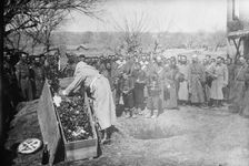 Burying soldier who cut barbed wire defence of Adrianople, 1913. Creator: Bain News Service