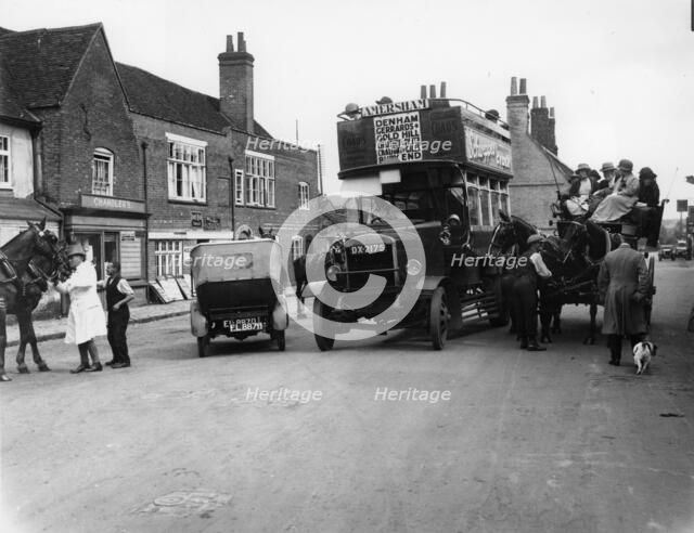 Bus on a street in Amersham, Buckinghamshire. Artist: Unknown