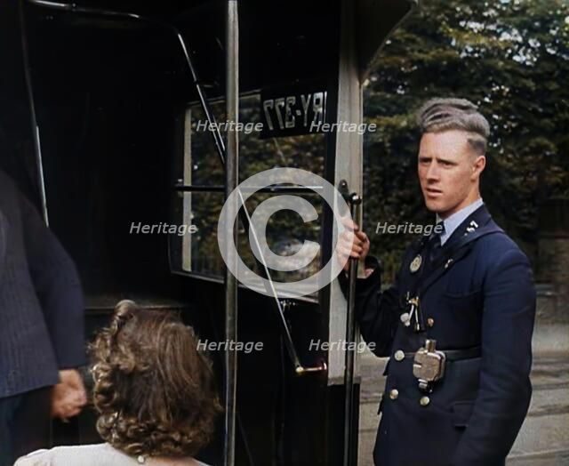 Bus conductor, 1940. Creator: British Pathe Ltd.
