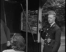 Bus conductor, 1940. Creator: British Pathe Ltd