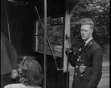 Bus conductor, 1940. Creator: British Pathe Ltd