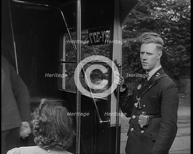 Bus conductor, 1940. Creator: British Pathe Ltd.