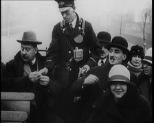 Bus Conductor Collecting Fares on the Open Top of a Bus, 1922. Creator: British Pathe Ltd