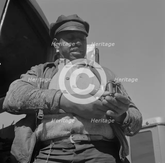 Bus driver, Daytona Beach, Florida, 1943. Creator: Gordon Parks.