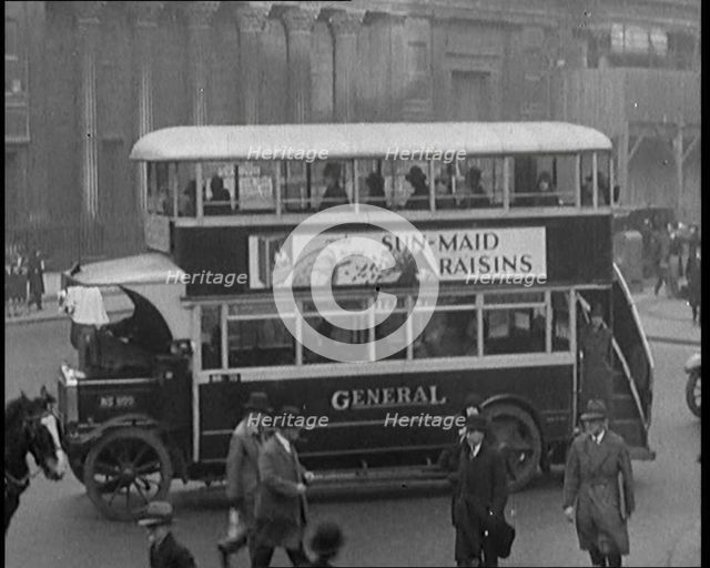 Buses Driving in Busy London Streets, 1929. Creator: British Pathe Ltd.