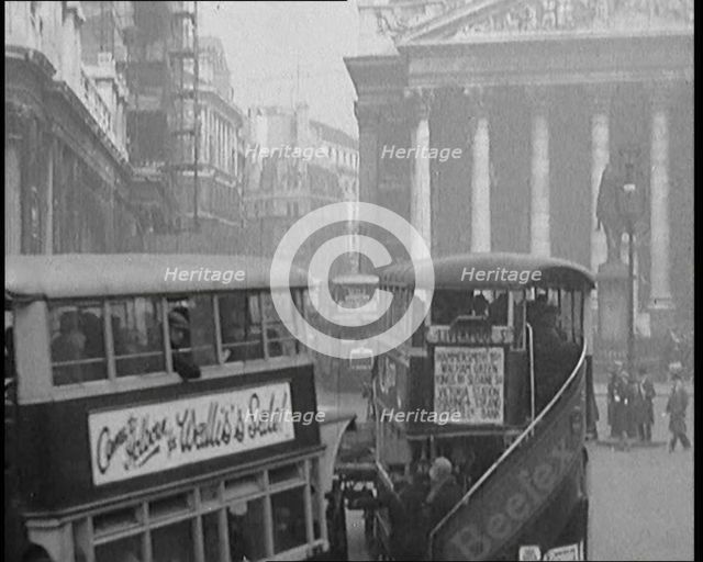 Buses Driving in Busy London Streets, 1929. Creator: British Pathe Ltd.