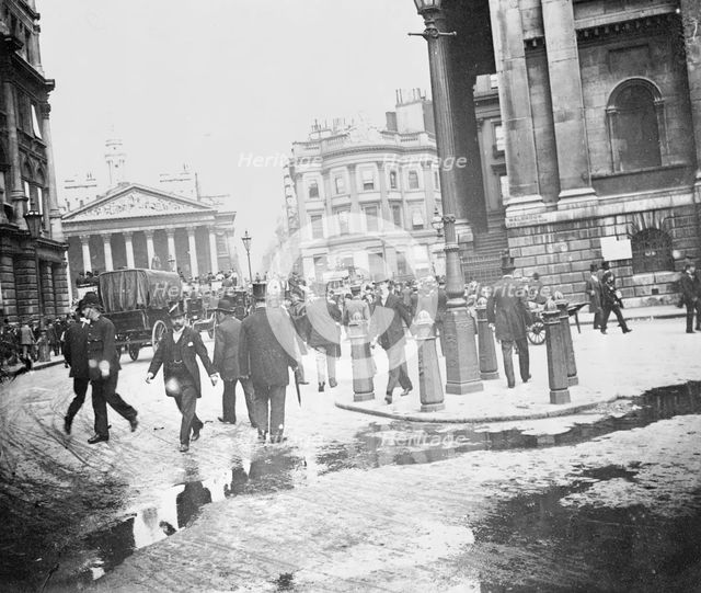 Businessmen by the Bank of England and the Royal Exchange, City of London, (1920s?). Artist: John H Stone
