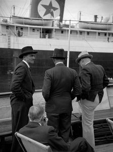 Businessmen on a ship in London docks, 1937. Artist: SW Rawlings