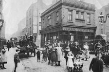Busy East End street scene, London, 1912. Creator: Unknown