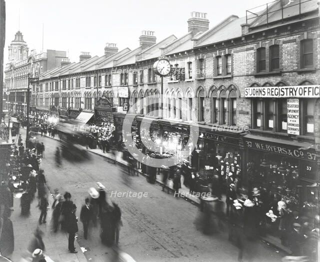 Busy street scene, St John's Road, Clapham Junction, London, 1912. Artist: Unknown.