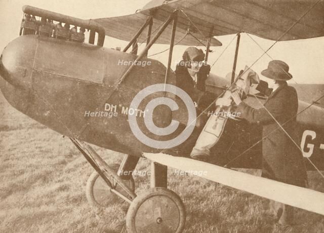 'By Air to the Golf Links in a Little 27-60 HP 'Moth' Light 'Plane', 1927. Artist: Unknown.