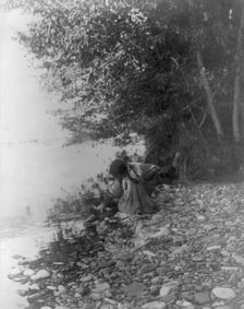 By the river-Flathead, c1910. Creator: Edward Sheriff Curtis
