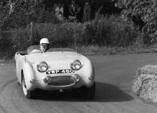 C Wells driving an Austin Healey Frogeye Sprite at the Wiscombe Park Hill, Climb, Devon, 1961. Creator: Unknown