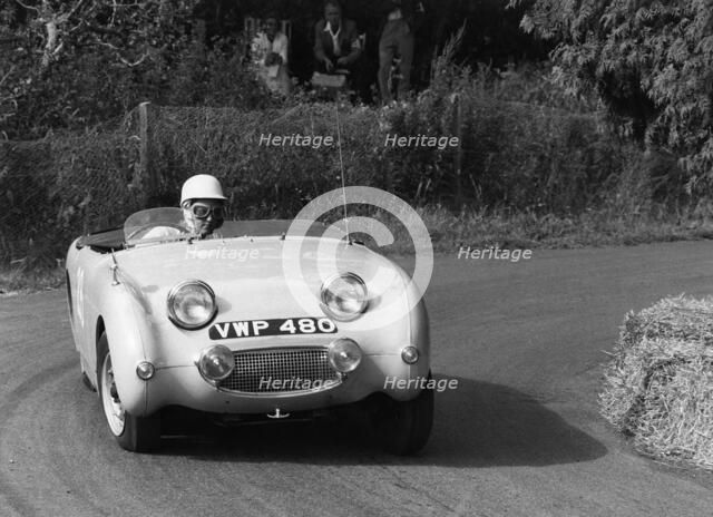 C Wells driving an Austin Healey Frogeye Sprite at the Wiscombe Park Hill, Climb, Devon, 1961. Creator: Unknown.