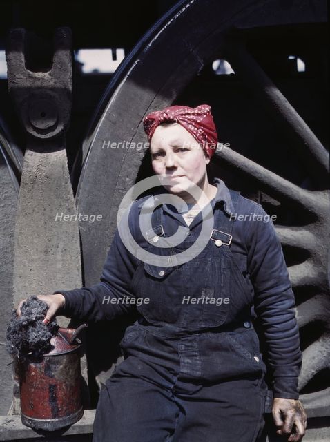 C. & N.W. R.R., Mrs. Marcella Hart, mother of three children, employed as a..., Clinton, Iowa, 1943. Creator: Jack Delano.