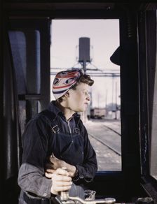 C. & N.W. R.R. Cloe Weaver, mother of four children, employed...the roundhouse, Clinton, Iowa, 1943. Creator: Jack Delano