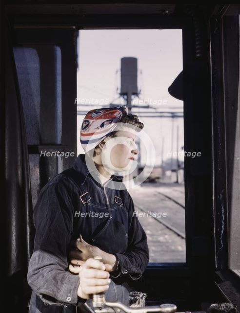 C. & N.W. R.R. Cloe Weaver, mother of four children, employed...the roundhouse, Clinton, Iowa, 1943. Creator: Jack Delano.