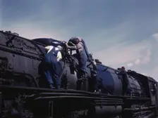 C. & N.W. R.R., women wipers employed at the roundhouse cleaning one of the..., Clinton, Iowa, 1943. Creator: Jack Delano