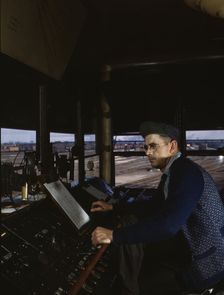 C&NWRR towerman R.W. Mayberry of Elmhurst, Ill., at the Proviso yard, Melrose Park, Ill., 1943. Creator: Jack Delano