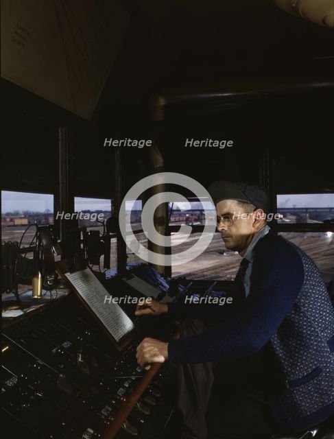 C&NWRR towerman R.W. Mayberry of Elmhurst, Ill., at the Proviso yard, Melrose Park, Ill., 1943. Creator: Jack Delano.