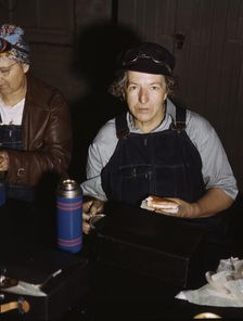 C. & N.W. R.R., Mrs. Elibia Siematter, employed as a sweeper at the roundhouse, Clinton, Iowa, 1943. Creator: Jack Delano