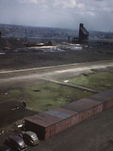 C & NW RR railroad workers cultivating a little Victory garden at Proviso yard, Chicago, Ill., 1943. Creator: Jack Delano