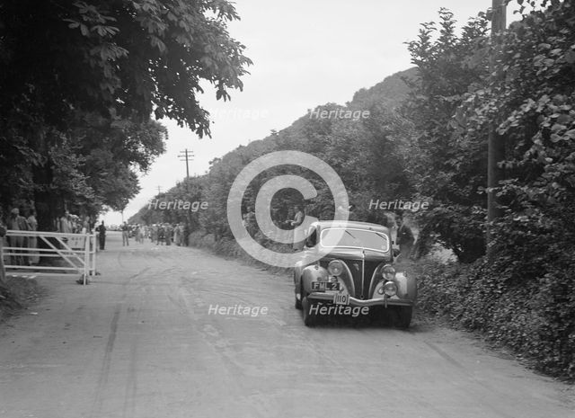 GM Denton's Ford V8, winner of a bronze award at the MCC Torquay Rally, July 1937. Artist: Bill Brunell.