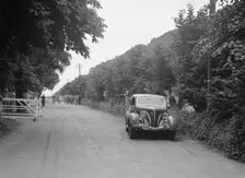 GM Denton's Ford V8, winner of a bronze award at the MCC Torquay Rally, July 1937. Artist: Bill Brunell