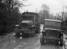 GMC 352 CCKW and Willys Jeep circa 1944. Creator: Unknown
