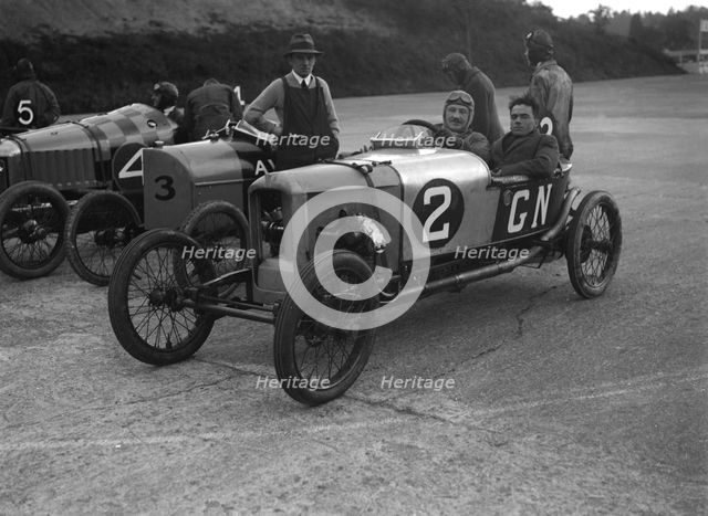 GN, AV and Deemster racing cars at the JCC 200 Mile Race, Brooklands, Surrey, 1921. Artist: Bill Brunell.
