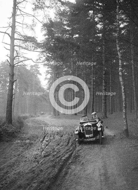GN of C Finch taking part in the JCC General Efficiency Trial, Oxshott Woods, Surrey, 1923. Artist: Bill Brunell.
