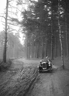GN of C Finch taking part in the JCC General Efficiency Trial, Oxshott Woods, Surrey, 1923. Artist: Bill Brunell