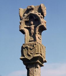 Gothic pillar-cross with the earliest known three legs of Man, 14th century