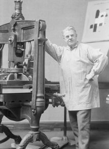 Goudy, Frederick, Mr., at his printing press, 1924 Mar. 15. Creator: Arnold Genthe