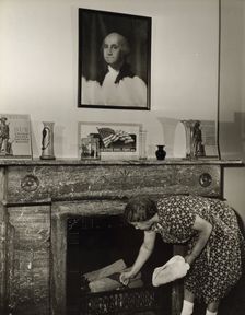 Government charwoman cleaning after regular working hours, Washington, D.C., 1942. Creator: Gordon Parks