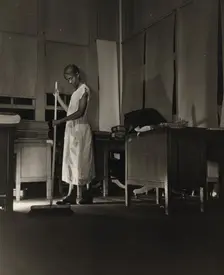 Government charwoman cleaning after regular working hours, Washington, D.C., 1942. Creator: Gordon Parks