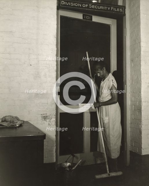 Government charwoman cleaning after regular working hours, Washington, D.C., 1942. Creator: Gordon Parks.