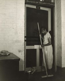 Government charwoman cleaning after regular working hours, Washington, D.C., 1942. Creator: Gordon Parks