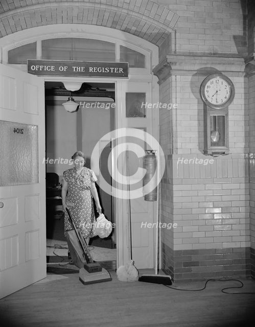Government charwoman cleaning after regular hours, Washington, D.C., 1942. Creator: Gordon Parks.