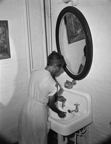 Government charwoman cleaning offices, Washington, D.C., 1942. Creator: Gordon Parks
