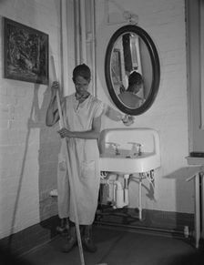 Government charwoman who provides for a family of six on her salary..., Washington, D.C., 1942. Creator: Gordon Parks