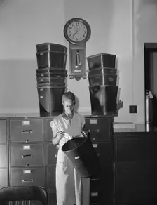 Government charwoman who provides for a family of six on her salary..., Washington, D.C., 1942. Creator: Gordon Parks